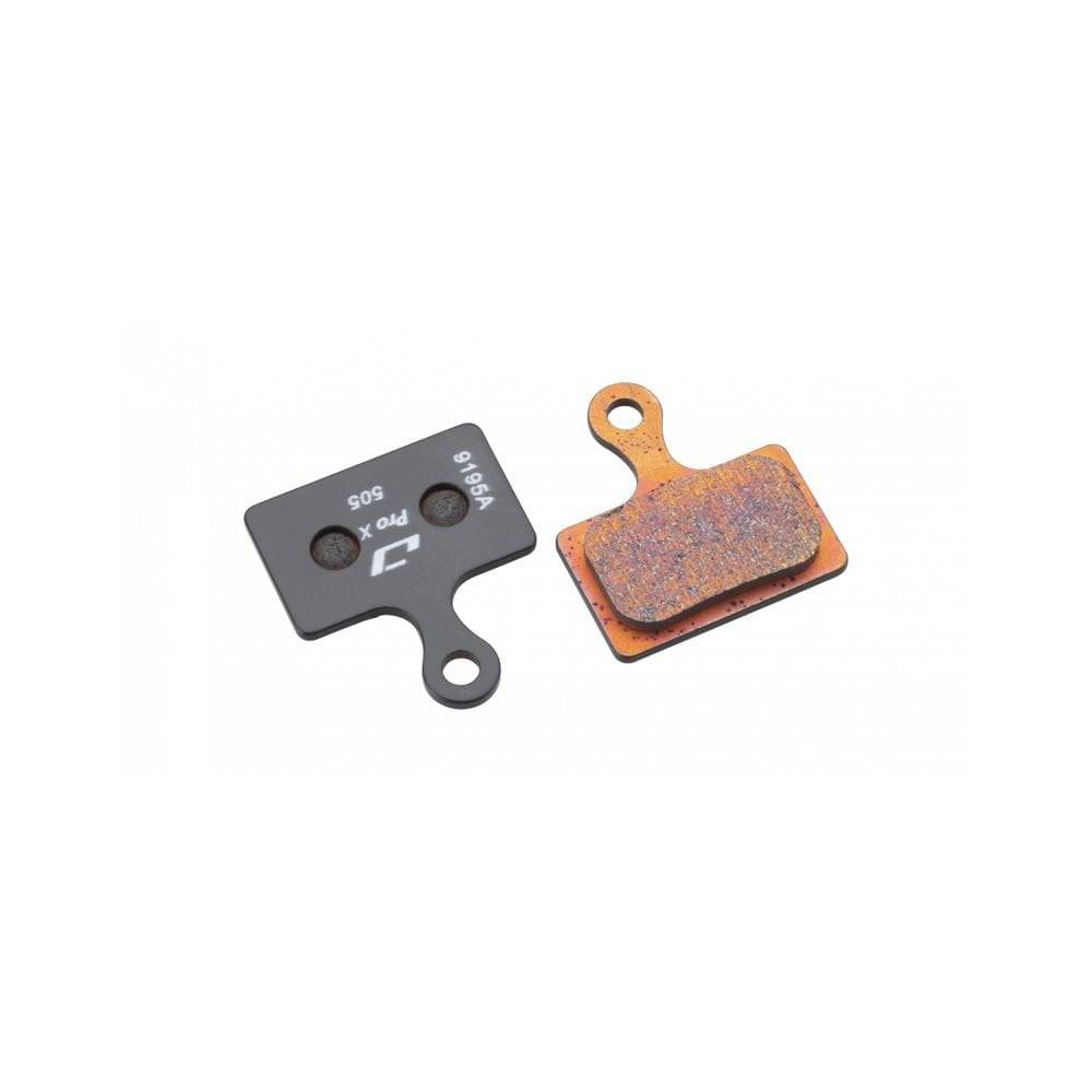 Jagwire Pro Extreme Sintered Disc Brake Pads for Shimano and Riderever bike brake systems, mounted on bike wheel.