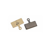 Jagwire Pro semi-metallic disc brake pads for Shimano and RideRever Cargo-D mountain bike brakes, showing the pads and packaging.