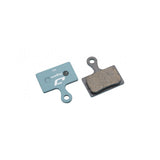 Jagwire Sport Organic disc brake pads for Shimano MTB and RideRever Cargo-x, blue color, bicycle component for braking system.