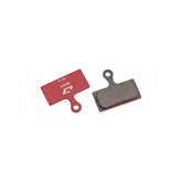 Jagwire Sport Semi-Metallic Disc Brake Pads for Shimano and RideRever systems, shown with metal backing and brake surface.