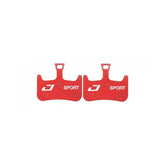 Jagwire Sport semi-metallic disc brake pads for Hayes Dominion A2 and T2 mountain bike brakes, close-up view of the components.
