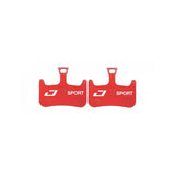 Jagwire Sport semi-metallic disc brake pads for Hayes Dominion A2 and T2 mountain bike brakes, close-up view of the components.