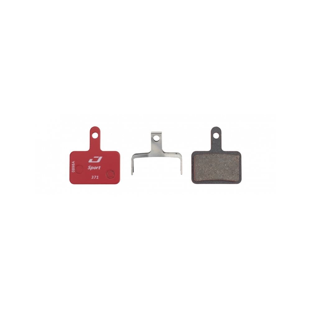 Jagwire Sport semi-metallic disc brake pads for Shimano and Promax systems, red color, bicycle brake components.