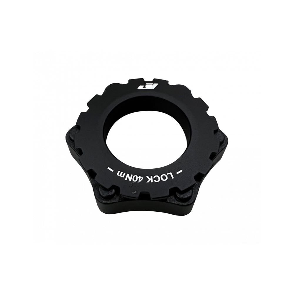 Jagwire 6-bolt to center lock disc rotor adapter for bike brakes, showing the metallic adapter component with bolt holes.