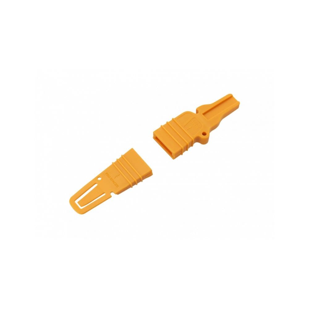 Jagwire yellow disc brake pad spacer and bleed block for hydraulic bike brakes, workshop tool for maintenance and bleeding.