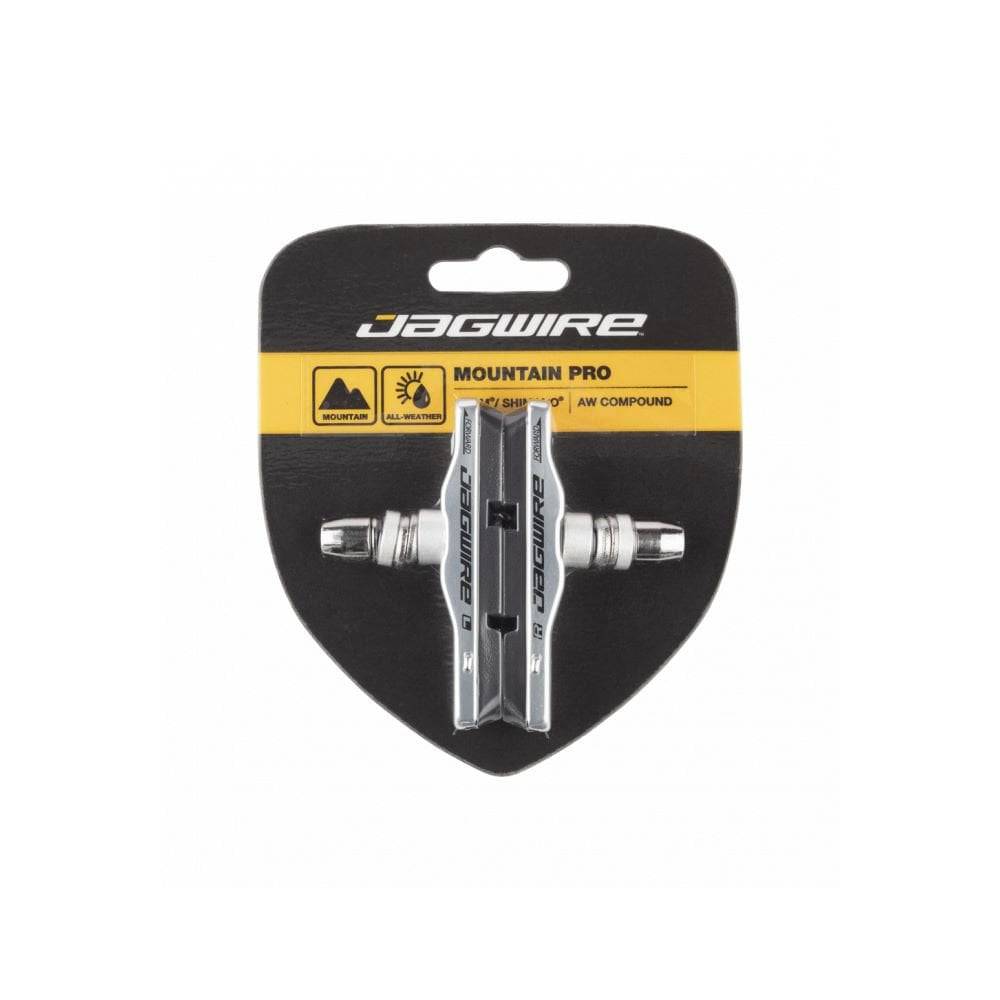 Jagwire Mountain Pro brake pads for linear pull and cantilever MTB brakes, showcasing their durable design and mounting hardware.