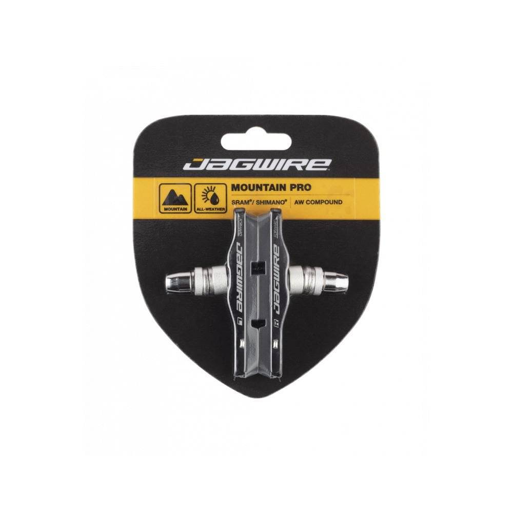 Jagwire Mountain Pro brake pads for linear pull and cantilever MTB brakes, showing close-up of the components and brake pad surface.