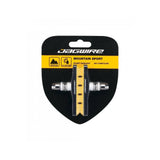 Jagwire Mountain Sport brake pads for SRAM and Shimano MTB bikes, designed for wet weather braking performance.