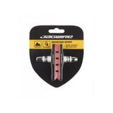 Jagwire Mountain Sport brake pads for SRAM and Shimano MTB bikes, designed for wet weather performance and reliable stopping.