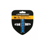 Jagwire Mountain Sport brake pads for SRAM and Shimano mountain bikes, designed for wet weather braking performance.