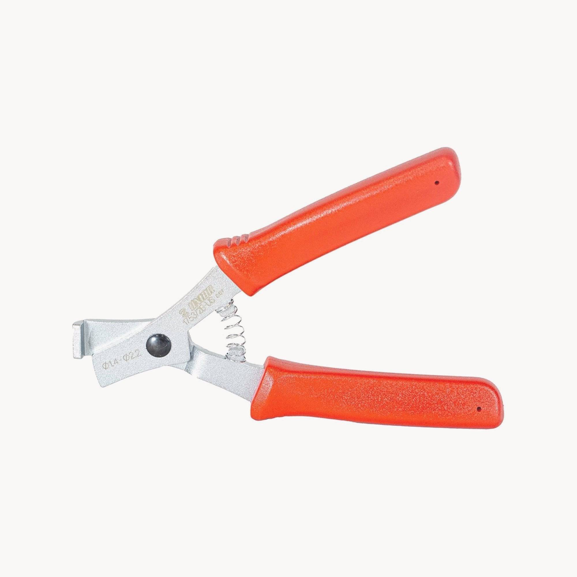 UNIOR red straight pull spoke pliers for wheel building, ergonomic workshop tool for precise grip and spoke handling.