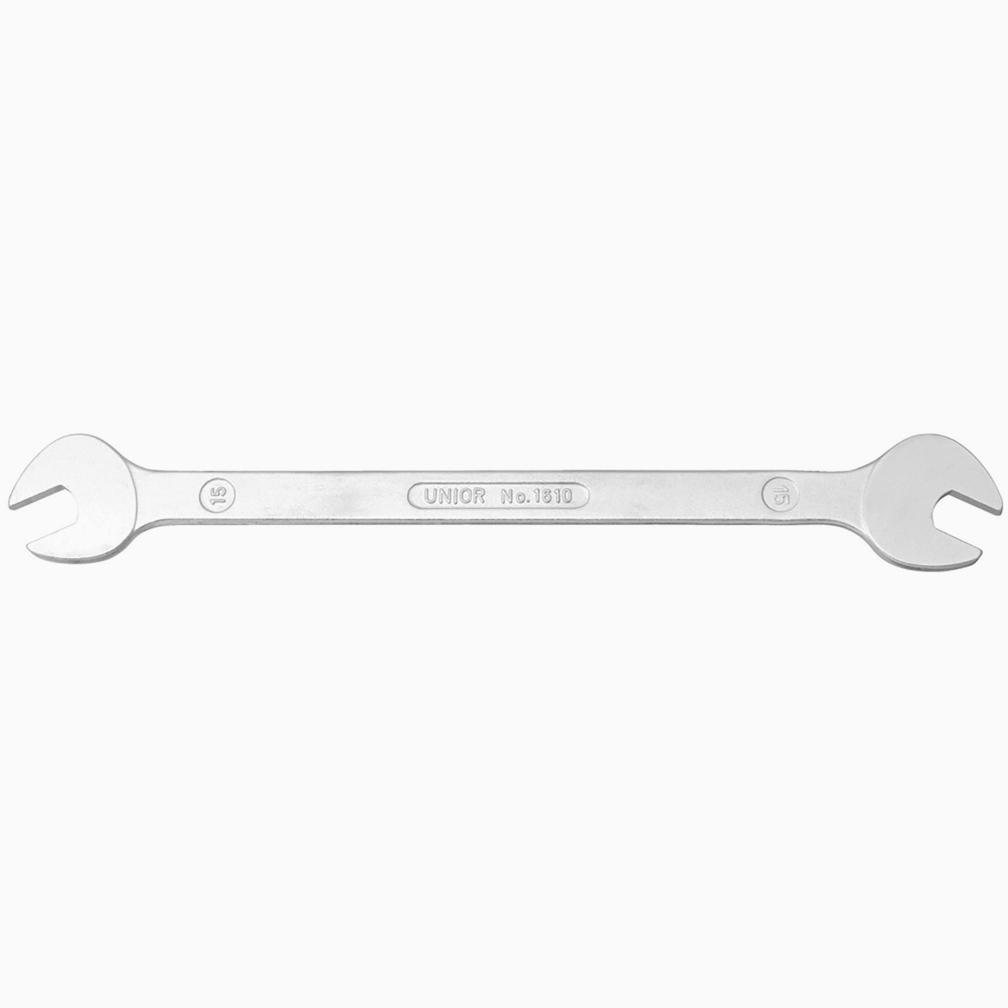 UNIOR double-ended pedal wrench with 15x15mm ends, durable bike tool for pedal installation and removal in a workshop setting.