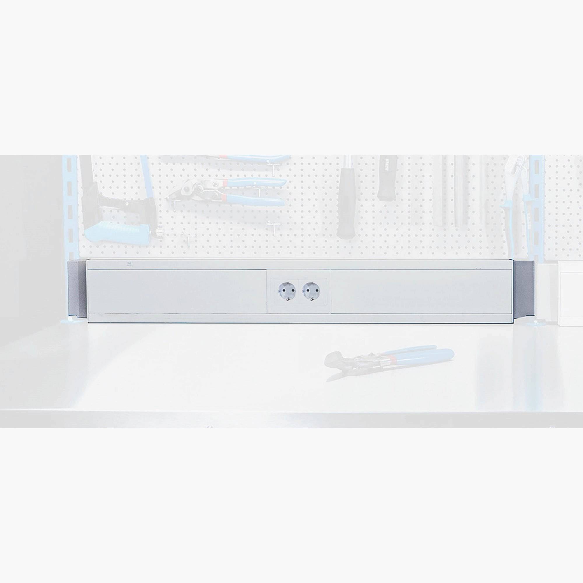 Blue UNIOR workshop holder with parapet channel, measuring 998x130x55mm, used as a support tool in workshops.