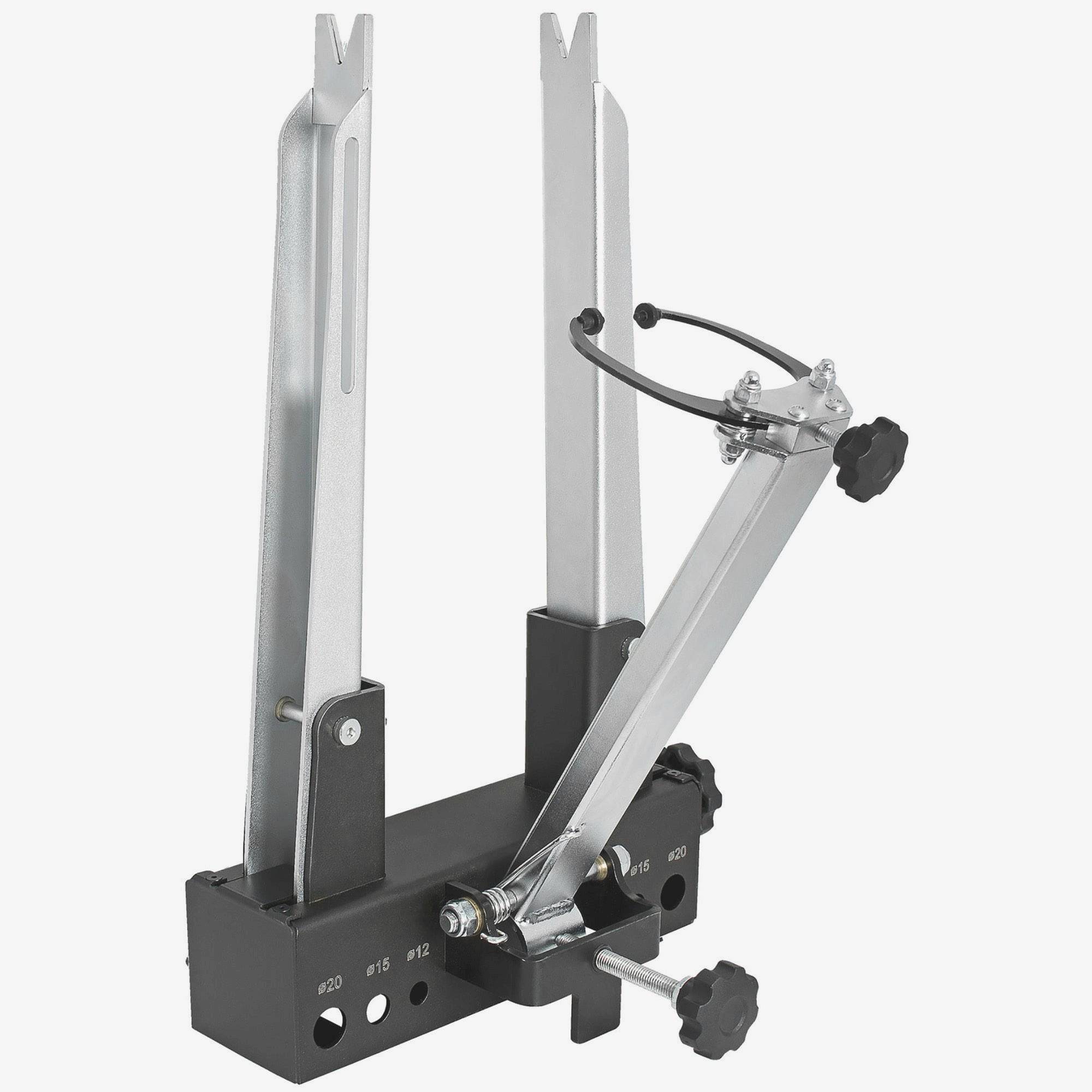 UNIOR Pro Truing Stand for bicycle wheels, 16-29 inch, with radial and axial control, used in bike workshop settings.