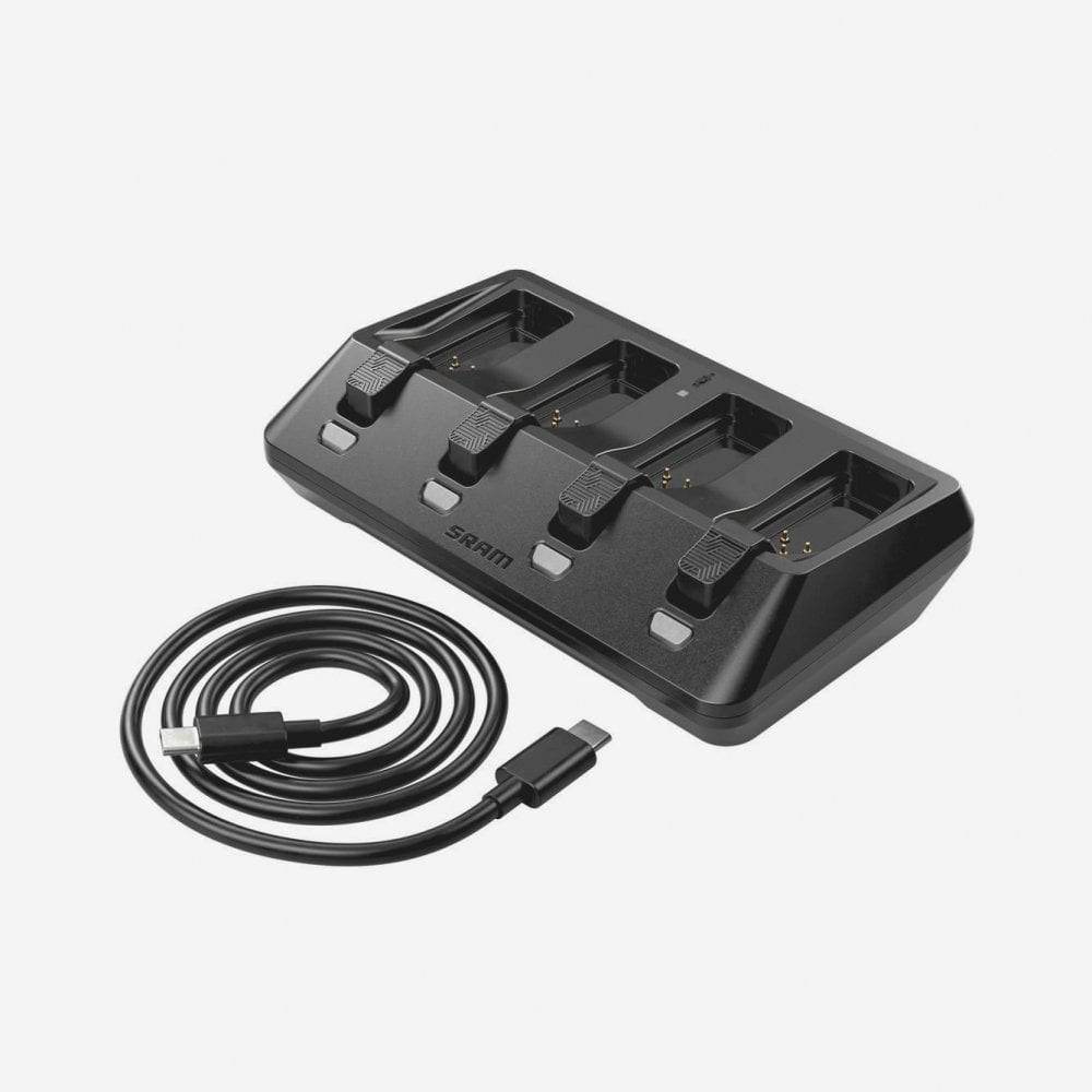 Sram AXS 4-Port Battery Base Charger with USB-C cord for fast charging of electronic bike components.