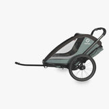 Hamax Cocoon child bike trailer and stroller accessory with a compact design, suitable for jogging and carrying children.