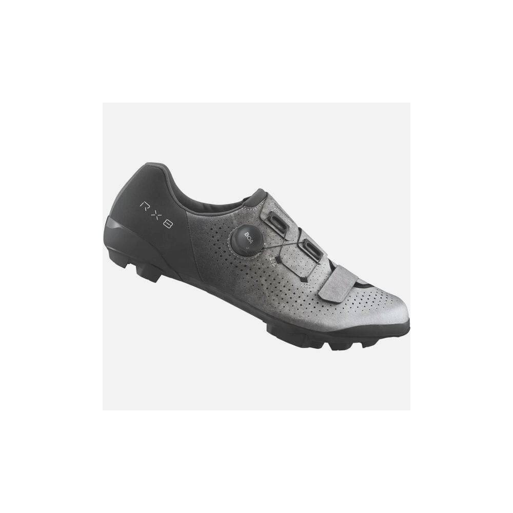 Shimano RX8 gravel shoes with BOA Li2 dial and carbon sole, shown in a close-up of the black and gray cycling footwear.