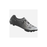 Shimano RX8 gravel shoes with BOA Li2 dial and carbon sole, shown in a close-up of the black and gray cycling footwear.