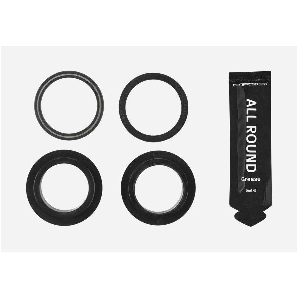 CeramicSpeed Shimano 24mm Threaded BSA PF46 bottom bracket service kit with components and tools for bike maintenance.