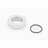 DVO Travel Spacer for Topaz 2 rear shock absorber, bicycle suspension component, close-up view of the metal part.
