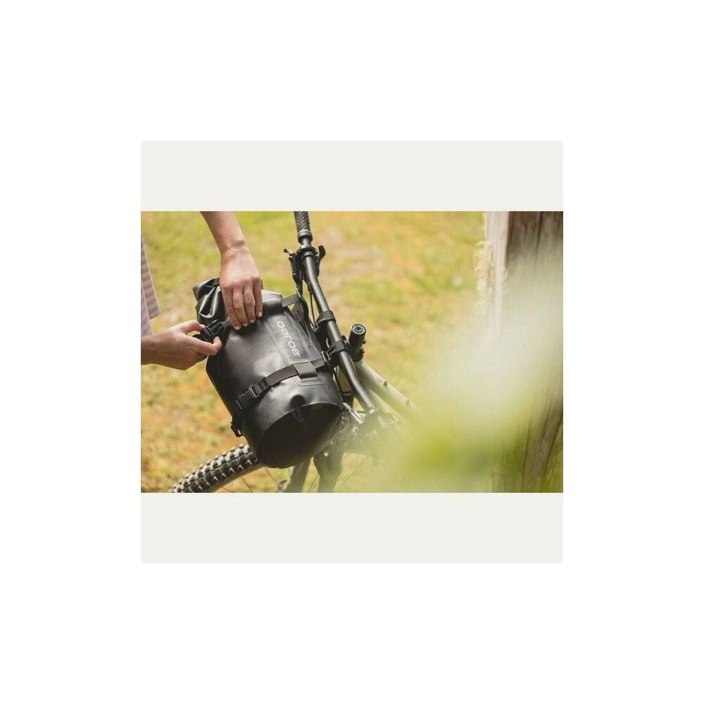 Aeroe 12L waterproof dry bag for bike packing, featuring a durable waterproof material and quick release system for secure storage.