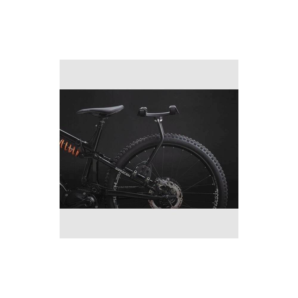 Aeroe Spider rear bike rack with versatile cradle mount system for bikes and e-bikes, shown mounted on a bicycle frame.