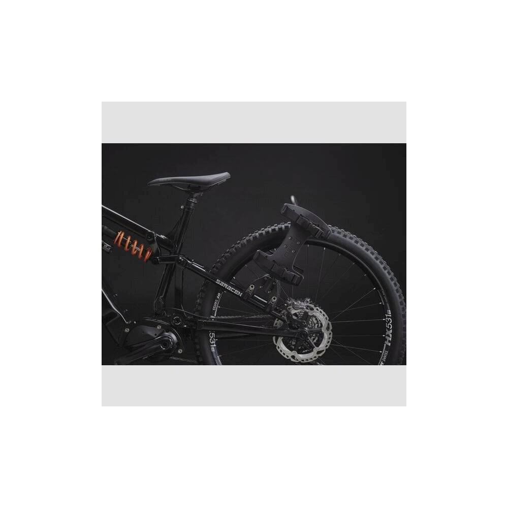 Aeroe Spider rear bike rack with versatile cradle mount system for bikes and e-bikes, shown installed on a bicycle.