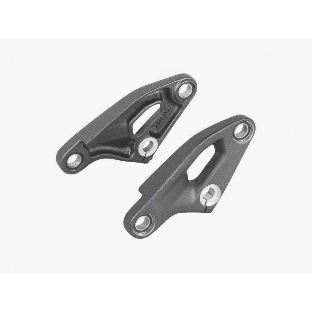 Trek Fuel EXe 9.7 29 2023 bicycle frame linkage component for suspension upgrade, showing detailed metal part.