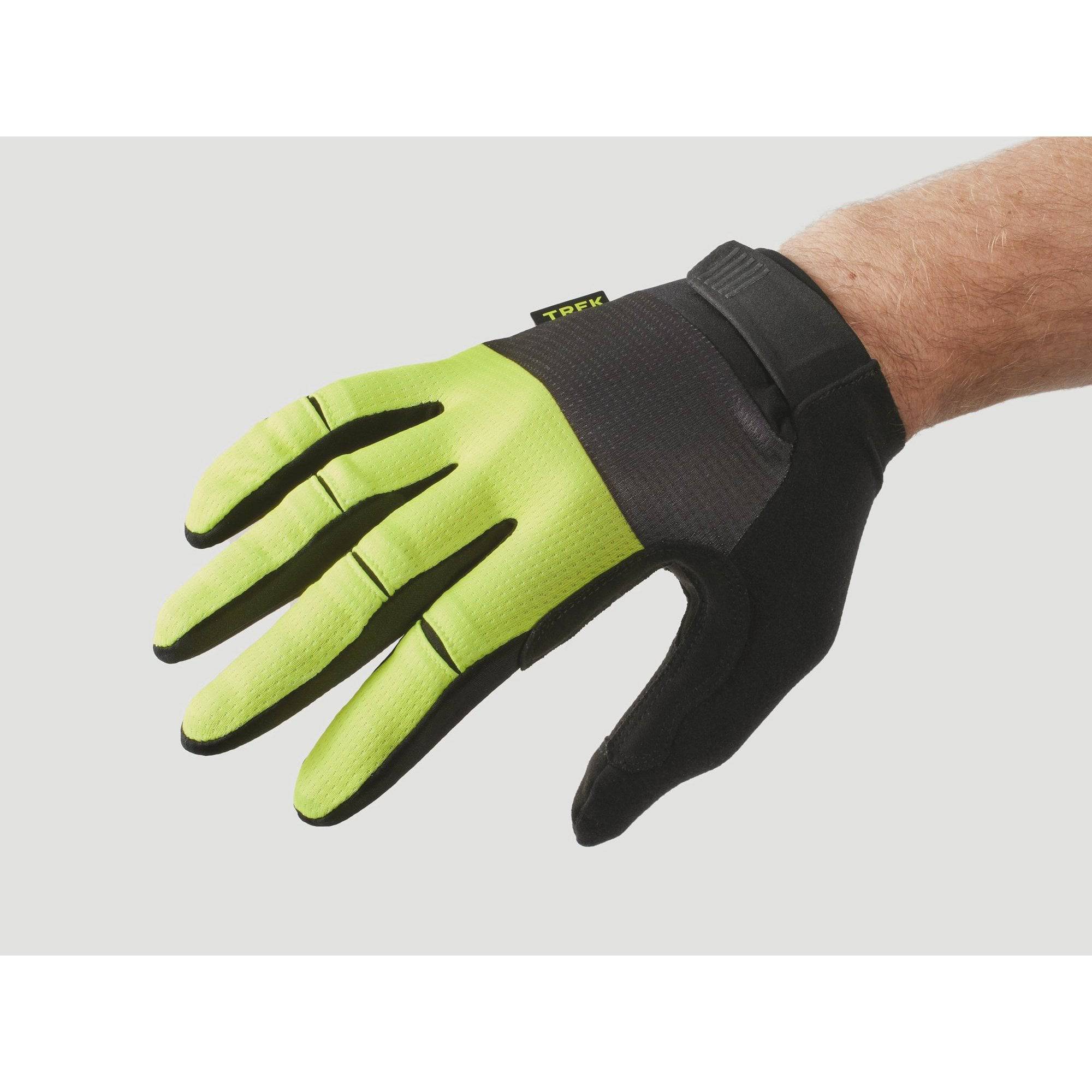 Trek Circuit full-finger unisex cycling gloves with twin gel padding for comfort, shown on a rider's hands.
