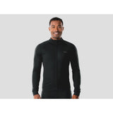 Trek Circuit softshell cycling jacket with windproof, waterproof fabric and fleece lining for outdoor biking comfort.