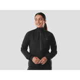 Trek Circuit Women's waterproof rain cycling jacket, lightweight and packable, shown in a bright color for outdoor riding.