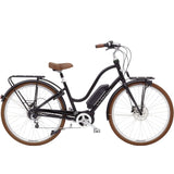 Electra Townie Commute Go! 5i EQ step-thru e-hybrid bike with Bosch motor and integrated racks, ready for urban commuting.