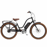 Electra Townie Go! 5i EQ step-thru electric hybrid bike with Bosch Active Line Plus motor, featuring a comfortable design and modern features.