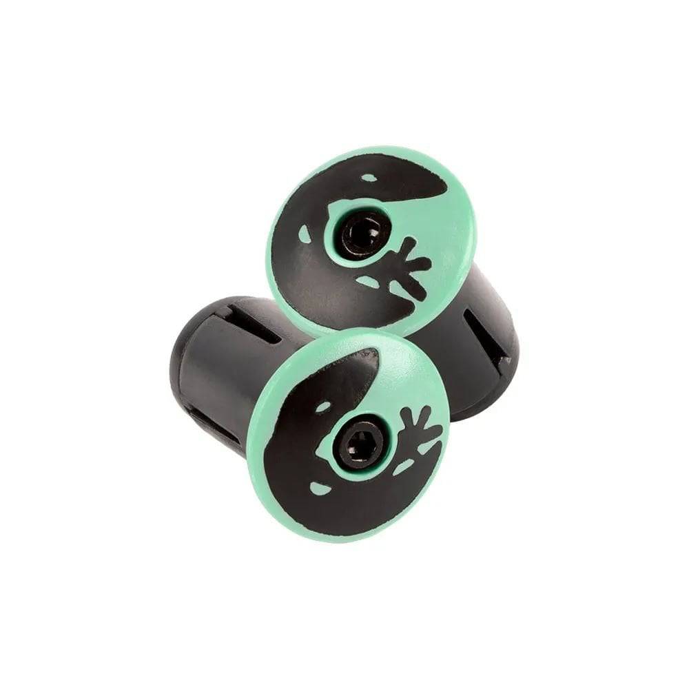 Lizard Skins DSP bar tape with packaged plugs for enhanced bike grip, showing textured black tape on bicycle handlebars.