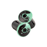 Lizard Skins DSP bar tape with packaged plugs for enhanced bike grip, showing textured black tape on bicycle handlebars.