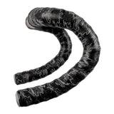 Lizard Skins DSP 1.8mm bar tape with screw-in plugs for road bike handlebars, providing grip and comfort.