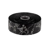 Lizard Skins DSP 1.8mm bar tape with screw-in plugs for road bike handlebars, showing textured black grip and installation details.