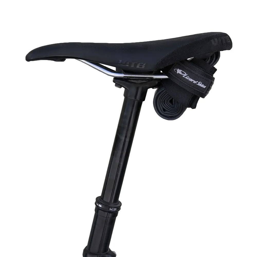 Lizard Skins black tube strap for bike spare tube, durable under seat accessory with secure strap for easy storage.