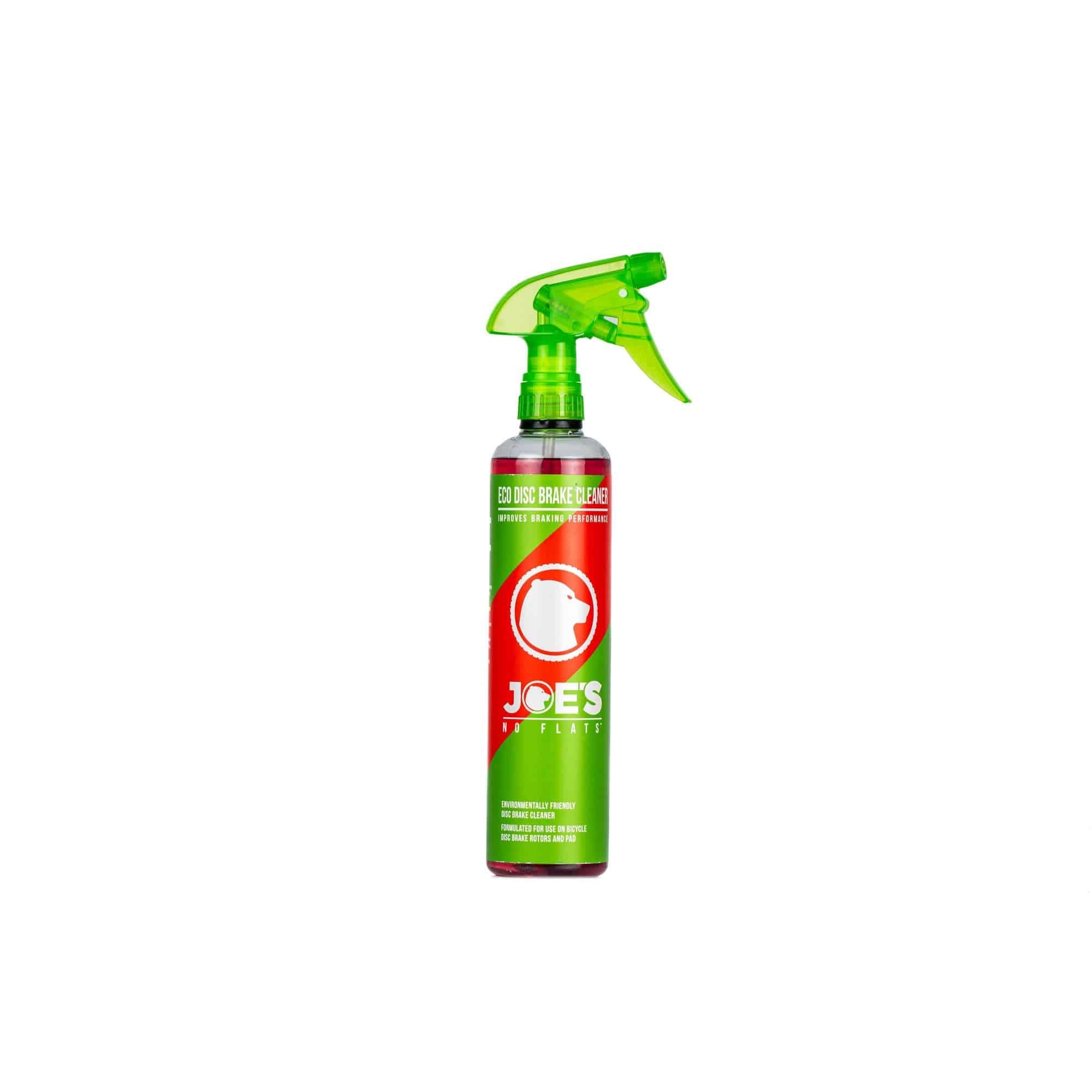 Joe's No Flats Eco Disc Brake Cleaner in a workshop setting, showing a spray bottle designed for eco-friendly brake and parts cleaning.