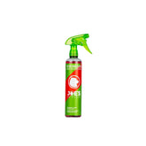 Joe's No Flats Eco Disc Brake Cleaner in a workshop setting, showing a spray bottle designed for eco-friendly brake and parts cleaning.
