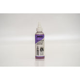 Joe's No Flats Suspension & Dropper Post Smoother Lube for bike shocks, 125ml, in a workshop setting, with lubricant bottle visible.