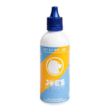 Joe's No Flats yellow e-bike chain lube bottle showing 120ml size for wet and dry weather protection.