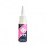 Joe's No Flats Road Leader sealant in a 60ml bottle, designed for high-pressure bike tires to prevent punctures and flats.