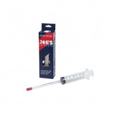 Joe's No Flats sealant injector for tubeless tires, component tool in black and silver with a nozzle for easy sealant application.