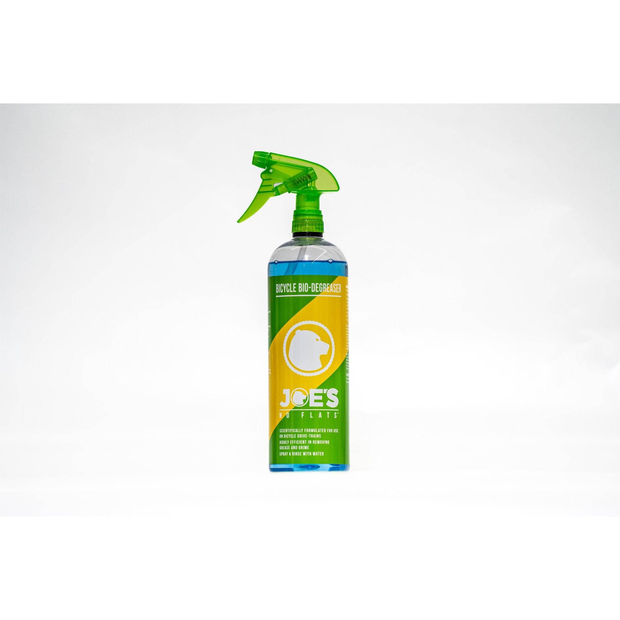 Joe's No Flats Bio-Degreaser Spray in a workshop setting, showing eco-friendly heavy-duty cleaner and degreaser in use.