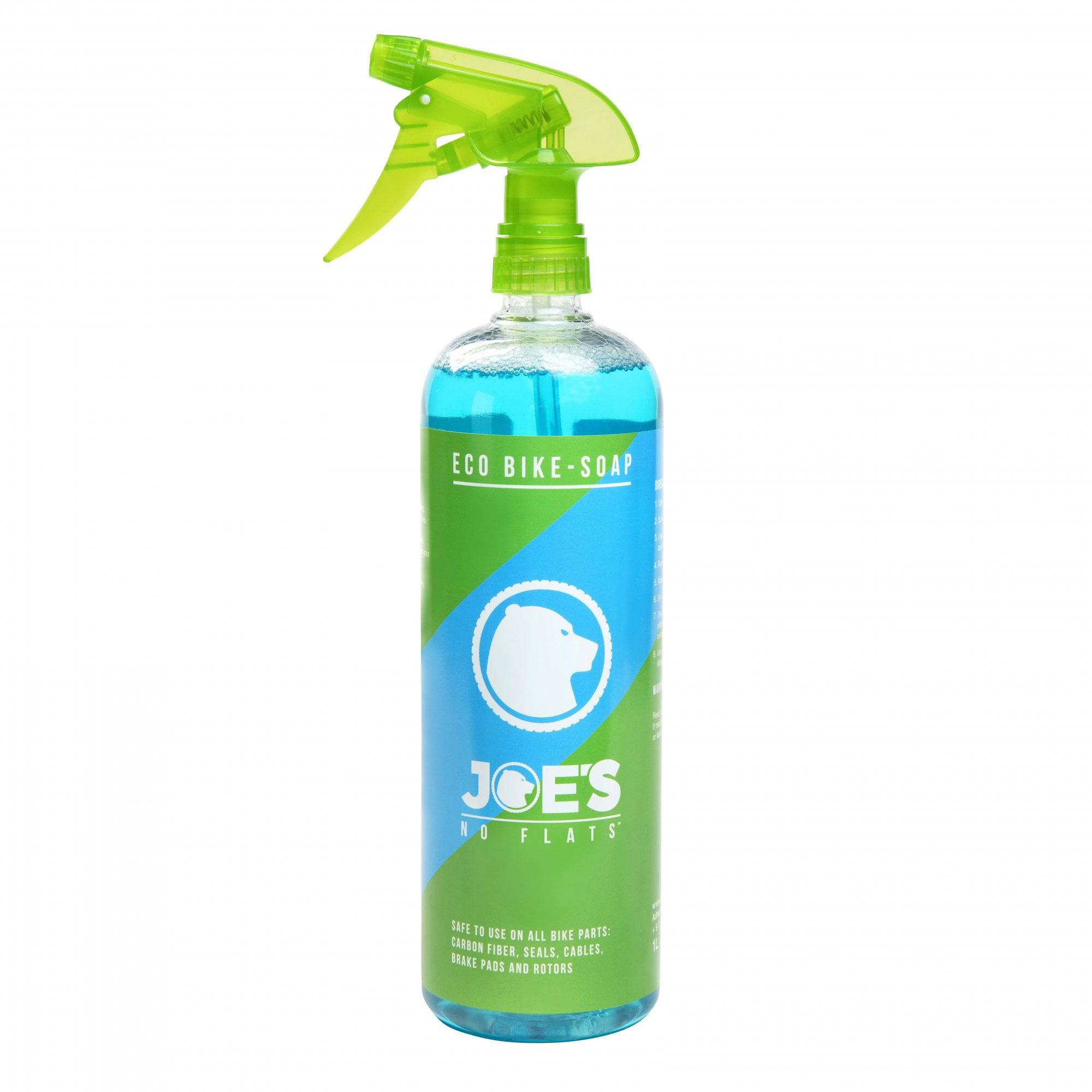 Joe's No Flats Eco Bike Soap in a workshop setting, showcasing natural, safe cleaner for bikes and gear.