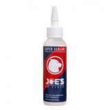 Joe's No Flats Super Sealant tubeless tire sealant for fast puncture repair, shown in a container.