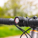 Black Exposure Fuse front light for e-bike, 1000 lumen LED, compact design, ideal for commuter electric bicycles.