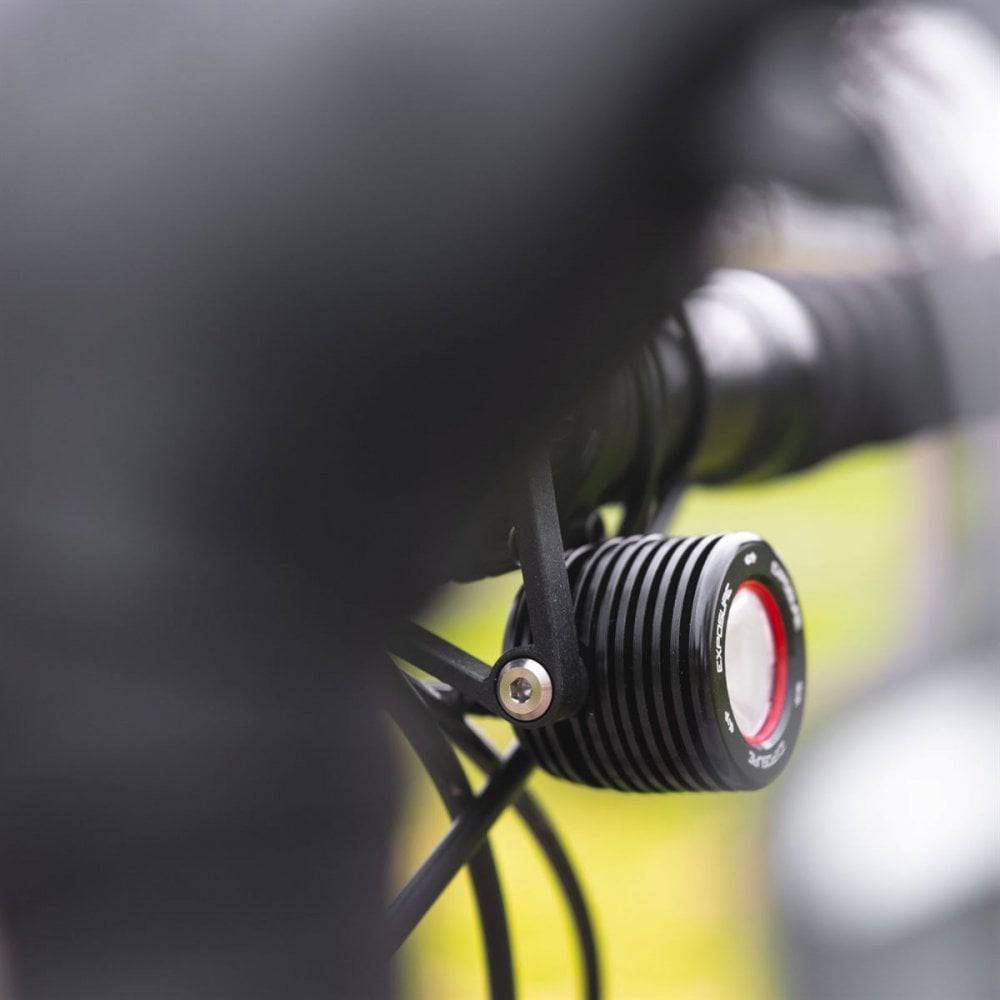 Exposure Fuse front e-bike light in black with 1000 lumens, featuring LED illumination and durable accessory design.