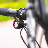 Black Exposure Fuse front light for e-bike commuter, 1000 lumen LED bike accessory with high visibility and durable design.